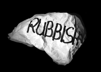 Crumpled paper saying "Rubbish"