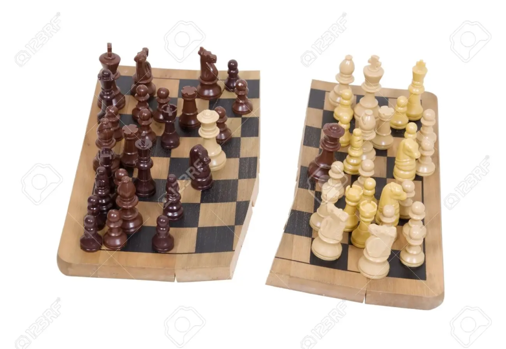 Stock image of broken chess board
