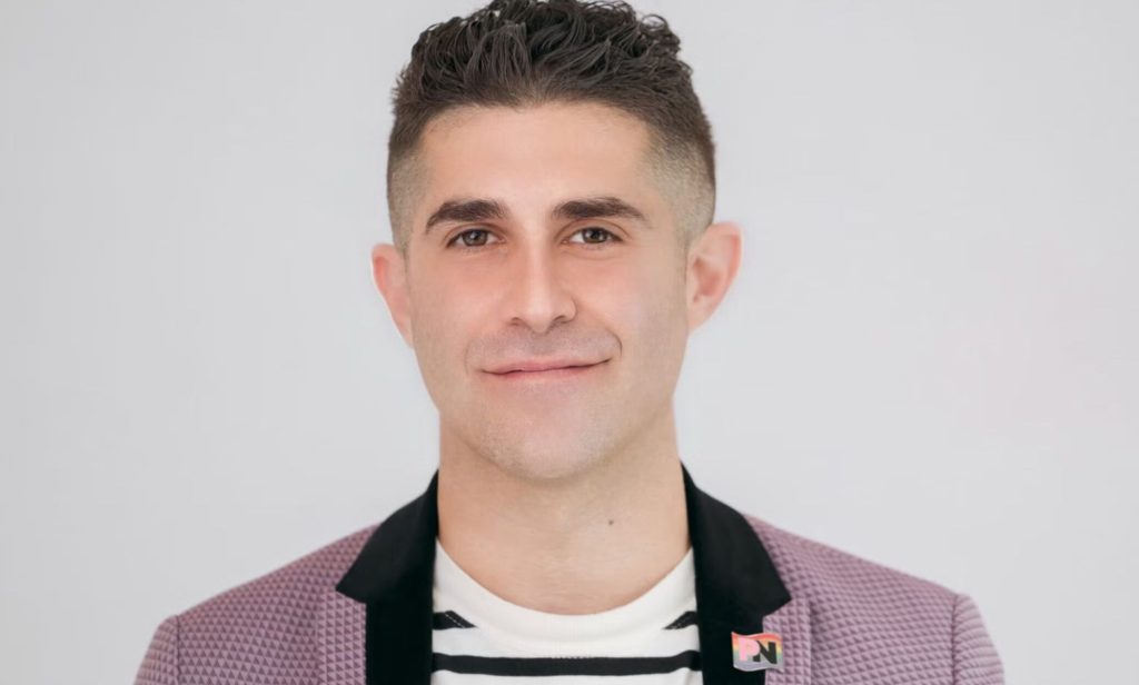 An official portrait image of Benjamin Cohen.